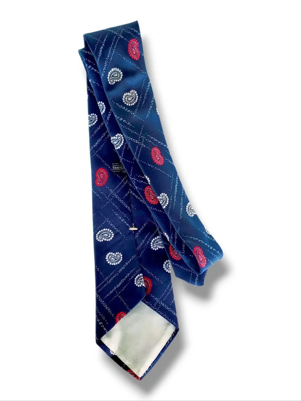 Sears Men's Shop vintage necktie features a classic navy blue base woven Paisley